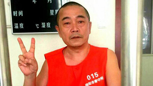 Huang Qi en el centro de detención