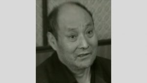Una imagen policial de Xu Wenku, el fundador del movimiento Tres Grados de Siervos