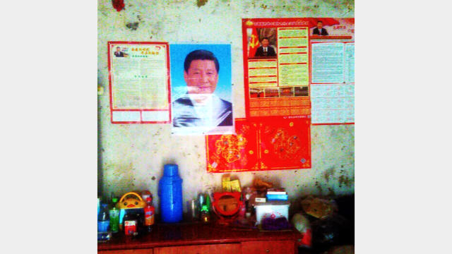 Retrato de Xi Jinping colgado en la casa de un cristiano